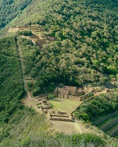 Discover the ancient Incan ruins of Choquequirao nestled in the Peruvian mountains.