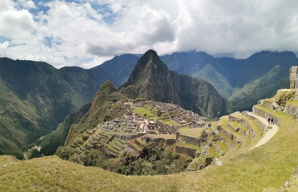 Explore the breathtaking ancient ruins of Machu Picchu nestled in the Peruvian Andes.